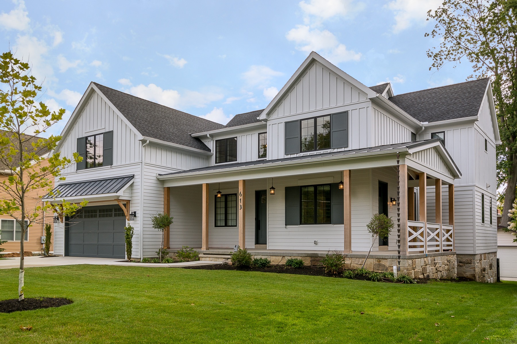 evergreen-portfolio-rocky-river-farmhouse-exterior-front-house-wide-alt-angle-3